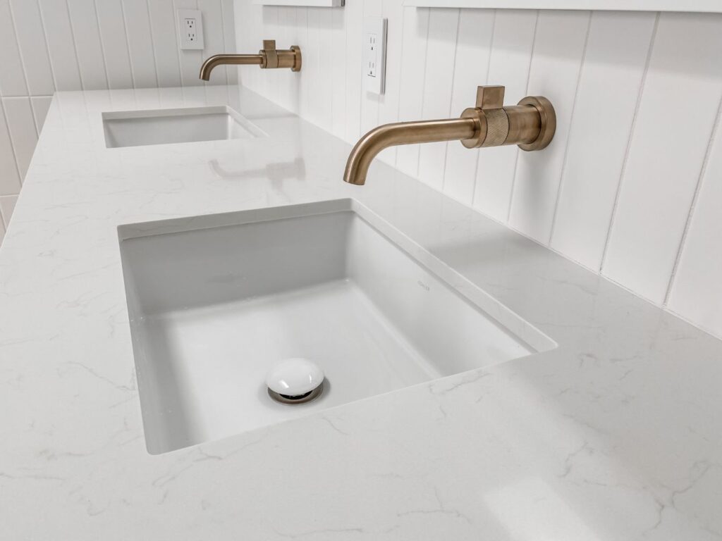 Duo Bathroom Sink with Golden Faucet