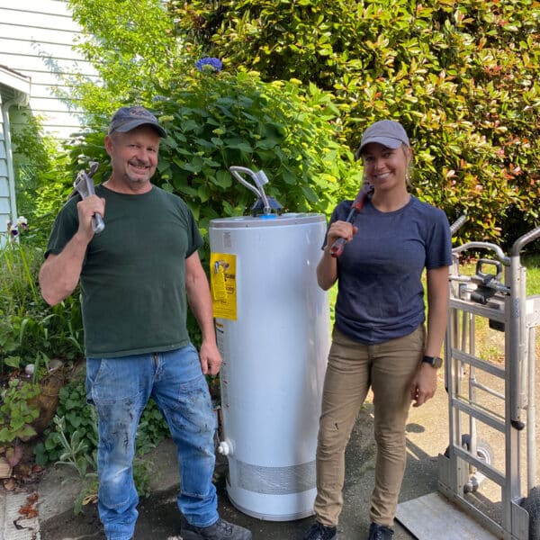 Water heater and dad and daughter - The Plumbing Physician