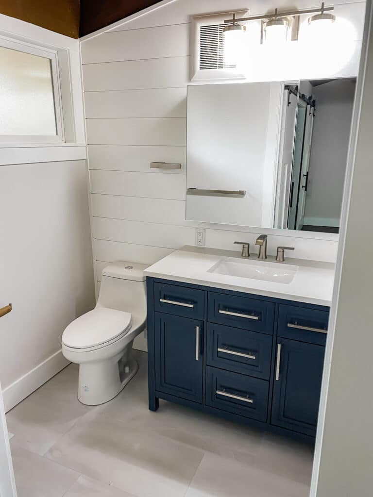 Replumbed bathroom with new toilet and sink